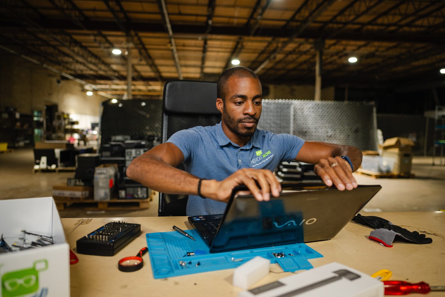 Markevis Gideon working at the NERDiT NOW warehouse